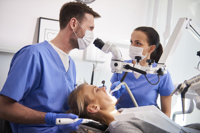 conversation between two dentist in dentists clini M4TSRXG